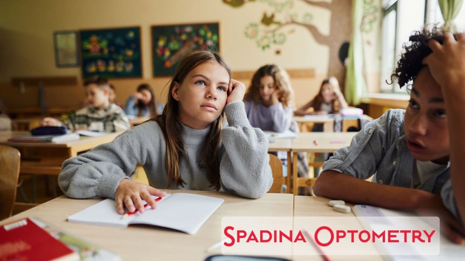 Student looking distracted in classroom